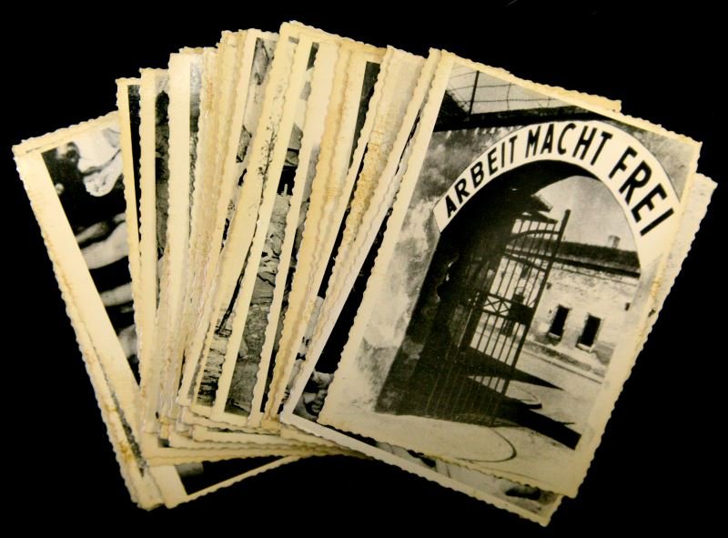 GROUP OF 40 HOLOCAUST PHOTOGRAPHS UKRAINE ARCHIVES: Backs of photographs are marked "Redeemed". Some yellowing and bending present; overall in very good condition.