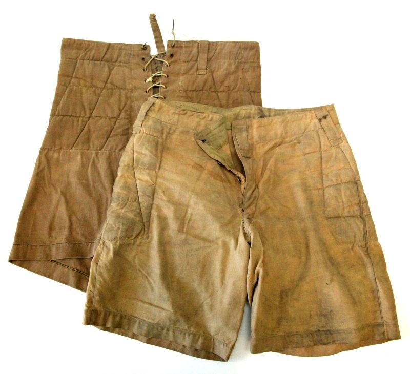 1900'S SPALDING & EDW. K. TRYON FOOTBALL PANTS: Two pairs of wearable condition late 19th to early 20th century padded sporting shorts, presumed football, shoestring laced front with button fly, one tagged Spalding A.D. 1876, the other Edw. K. Tryo