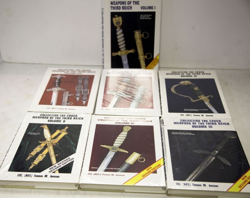 COLLECTING THE EDGED WEAPONS OF THE THIRD REICH: Seven-volume series by Lieutenant Thomas M. Johnson (retired US army) (Volumes I - VIII minus volume II (out-of-print). All wrapped in plastic, new condition. This lot has a reserve.