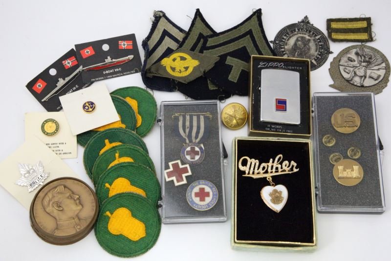 ZIPPO RED CROSS SWEETHEART BADGE MEDAL & PIN LOT: Includes boxed Zippo bottom date 1969, WWII patch and insignia lot, two ST. Christopher medals, U.S. Army Mother sweetheart brooch, original box, American Red Cross medal and two pins, Corp of Enginee