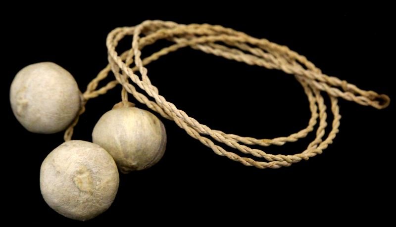 NATIVE AMERICAN HUNTING BOLAS THREE STONE: Three balls covered in hide with fiber cord, we crafted and usable.