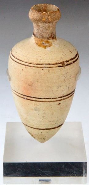 MINIATURE MONOCHROME AMPHORA HOLY LAND TERRACOTTA: Holy Land - Miniature monochrome terracotta amphora. Circa 1000-700 B.C. Found in Amman. Soft spun design with organic roughness to top. Used to hold oil. Restored. Just over 4 inches tall. Overall ve
