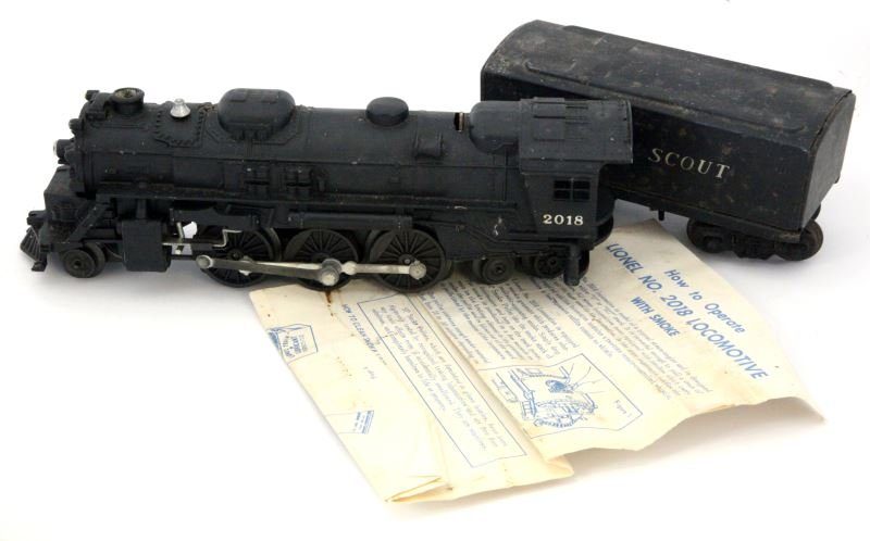 LIONEL TRAINS STEAM ENGINE 2018 PLUS SCOUT TENDER: Lionel Trains Steam Engine 2018 with Lionel Scout tender. Lionel O27 marked to bottom. Vintage collector condition. Original box for engine.