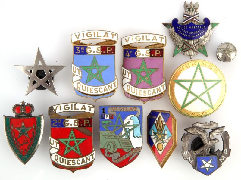 MAROC ANTIQUE POLICE BADGE MUSEUM COLLECTION: From the World Police Museum, Milan, Italy, ten badges and one button, enamel is complete on all but one, rubber washers are on reverse to affix, comes with COA from museum.
