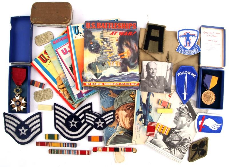 MILITARY MEDAL RIBBON PATCH BOOK & GEAR LOT: Includes Belgium Order of the Knight medal, U.S 1932 ROTC equipment race medal, Medal and Breast order, first aid kit, WWII U.S. propaganda books, patches and more.