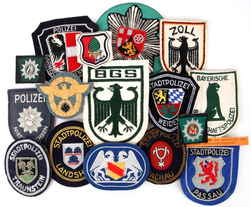 VINTAGE GERMAN POLICE PATCHES VARIOUS ERAS BORDER: Small group of better German Police patches, 16 total. Includes WWII embroidered third reich patch, land police, border police, Bavarian riot police, different regions, and more! All in great conditio
