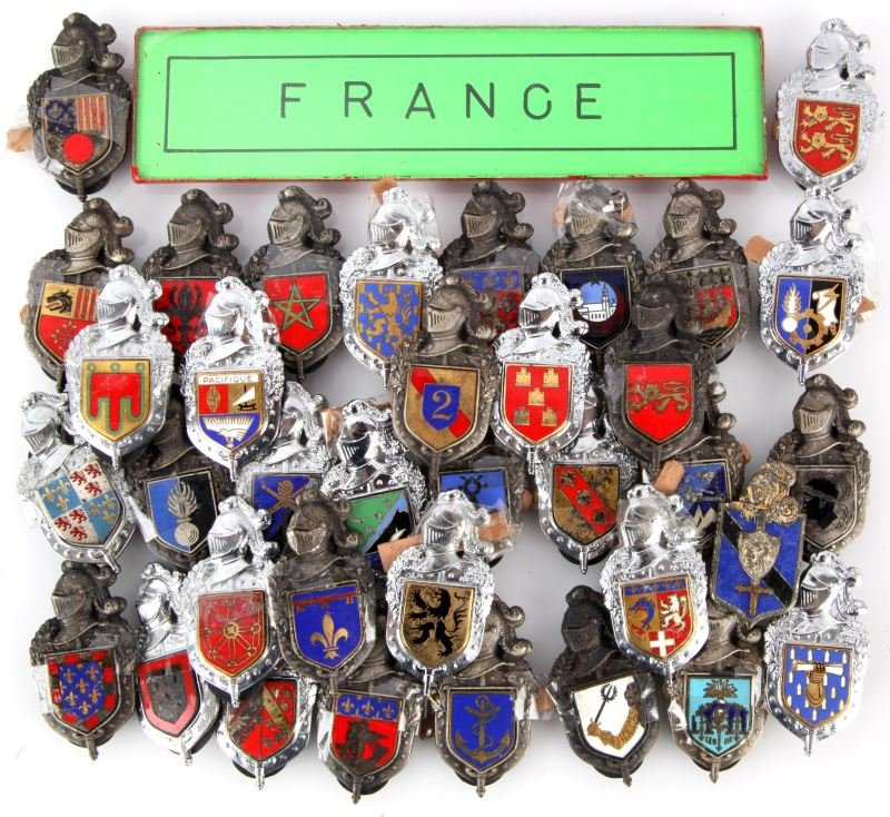 36 VINTAGE FRENCH POLICE GENDARMERIE CAP BADGES: 36 French Police badges. All different regions with tag attached. Removable rubber mounts and straight pin backs. Color enamel to center, made of pewter, some chrome finish. Nice collection from World
