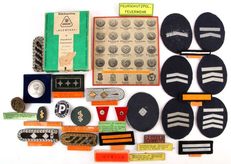 WWII PRE & POST GERMAN POLICE INSIGNIA & BADGES: From the World Police Museum, Milan, Italy, and is accompanied with COA, variety of police insignia and includes a alcohol testing kit, most pieces are identified by the museum.
