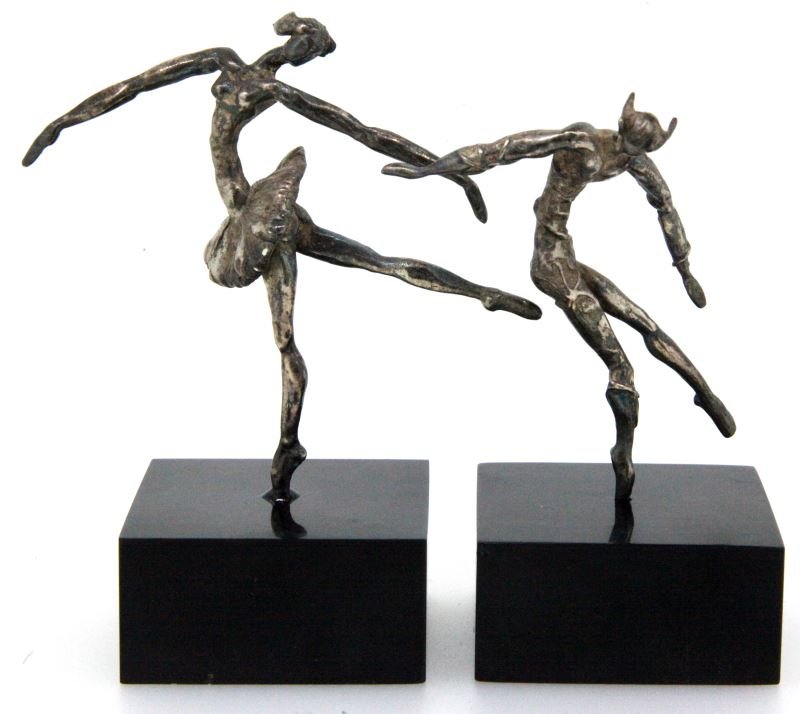 VINTAGE PAIR OSCAR J BERLIN STERLING SCULPTURES: Designed and crafted by Oscar J. Berlin, craftsman for Tiffany, Gorham and others. Contemporary design, wrought in sterling silver, with ebony base. Pieces include "Bluebird Ballerina" and "Bluebird D