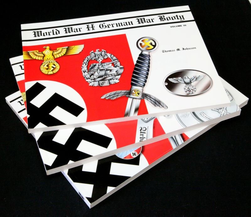 WORLD WAR II GERMAN WAR BOOTY, VOLUMES III, IV, V: Thomas Johnson's "World War II German War Booty" Volumes III, IV, and V. All in near mint condition. This lot has a reserve.