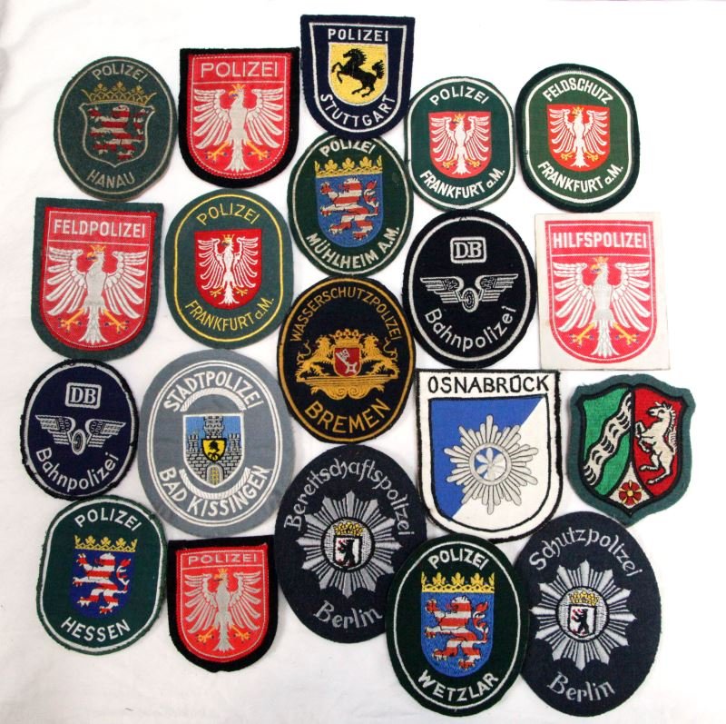 20 VINTAGE GERMAN POLICE SHOULDER PATCH LOT: Grouping of scarce obsolete cloth shoulder patches, 20 in all, no duplication, circa 1940's amd 1950's, from the World Police Museum, Milan, Italy and is accompanied with COA.