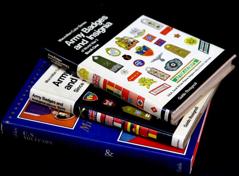 3 MILITARY BOOKS PERTAINING TO MEDALS AND BADGES: Includes "Army Badges and Insignia" by Guido Rosignoli Volumes 1 and 2 and "United STates Military Medals & Ribbons" by Philip K. Robles. Light show of age present to books; overall in very god condit
