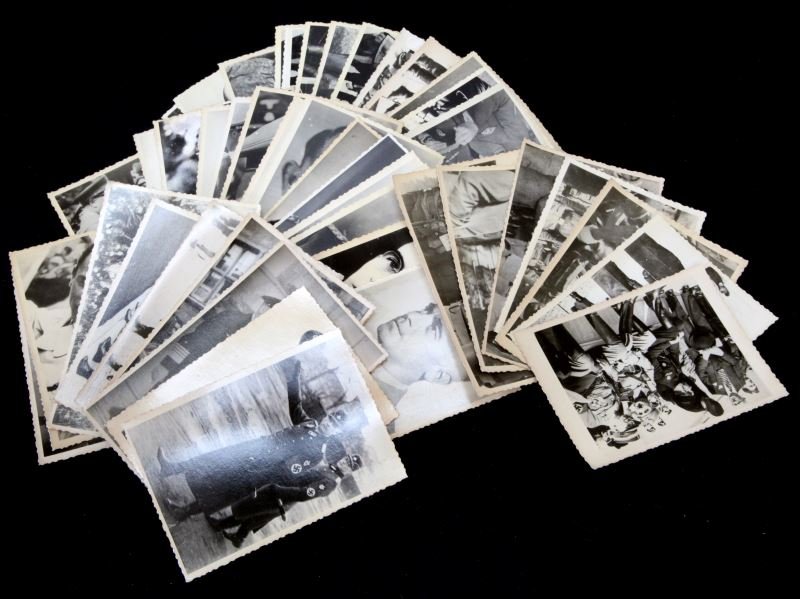 48 UKRAINIAN ARCHIVE PHOTOGRAPHS OF SS MEN: Backs of photographs are marked "Redeemed". Some foxing and creasing present; overall in very good condition. Unauthenticated.