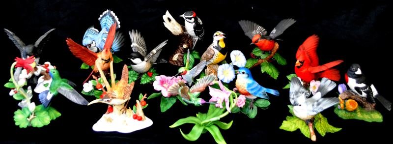 LENOX PORCELAIN BIRD COLLECTION OF 15 DIFFERENT: Each figurine stands four to six inches, they include Downy Woodpecker, Rose Breasted Grosbeak, Cardinal, Chickadee, Dark Eyed Junco, Tufted Titmouse, Vermilion Flycatcher, Hummingbird, Magnificent Hu