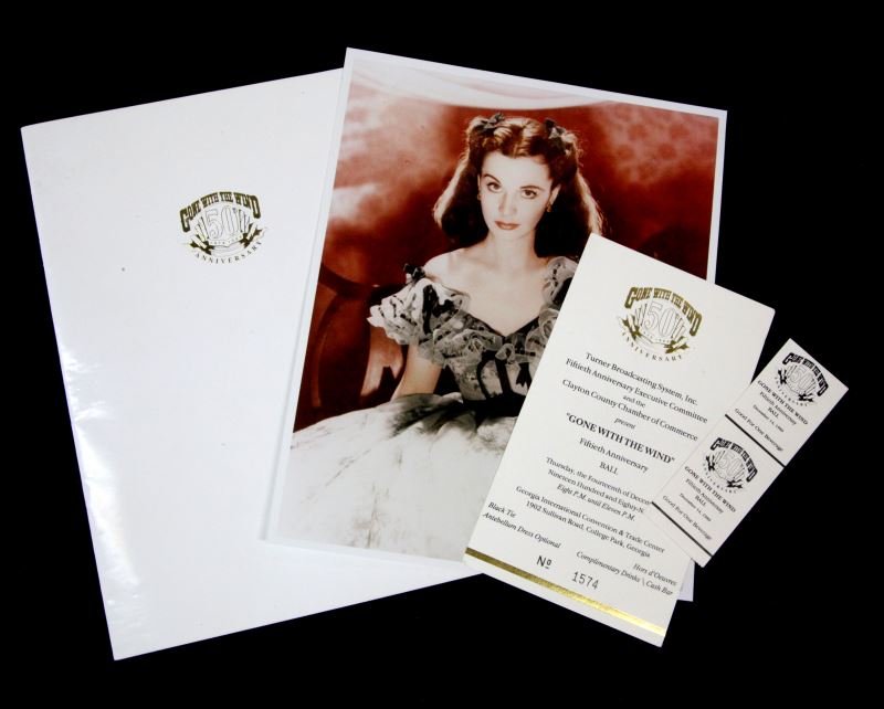 GONE WITH THE WIND 50TH ANNIVERSARY PROGRAM: Program with tickets to the Ball and a drink ticket, and a press photo of "Scarlett".