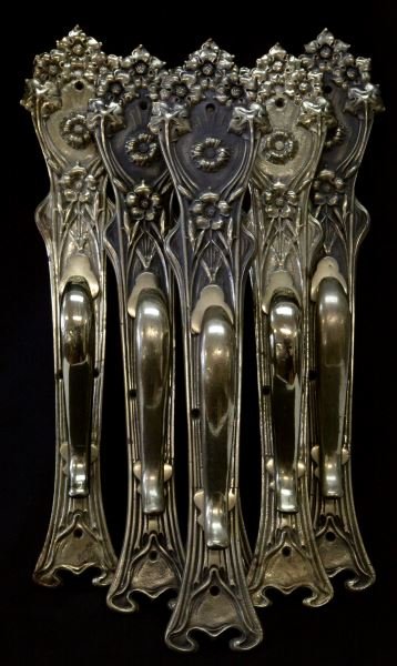 SET OF 6 LARGE ART NOUVEAU HEAVY BRASS DOOR PULLS: Stylized floral design. Solid brass forged door pulls measuring 20.5 inches tall and 4.5 inches at widest point. Bolted handles. Flush mount (small holes needed for handle bolts) with four screws. Eac