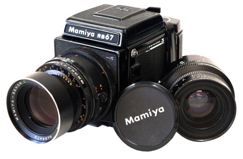 MAMIYA RB67 PRO S W/180MM AND 90MM LENSES +EXTRAS: Includes RB 67 PRO body in good condition, Mamiya 180mm 1:4.5 lens, one 220 film pack, Mamiya /Seiko 90mm lens, Sunpak auto 544 strobe flash attachment, Stroboframe system handled frame with plunger, 