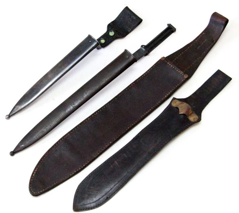 SPANISH AMERICAN WAR KRAG & KNIFE SCABBARD LOT: Includes U.S. Model 1903 type IV Krag scabbard, 1897 Krag Cadet scabbard Type V, Field medic knife leather scabbard, lastly leather machete scabbard.