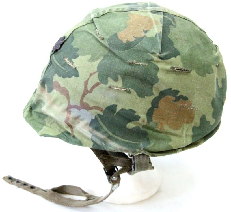 VIETNAM M1 LT. COL. HELMET AIRBORNE CONFIGURATION: Complete M-1 helmet woodland reversible Camo with LT. COL. oak leaf, smooth green OD paint on helmet wit 2-1 sticker fore and aft, DSA-71 M at crown Airborne liner, complete and very good.