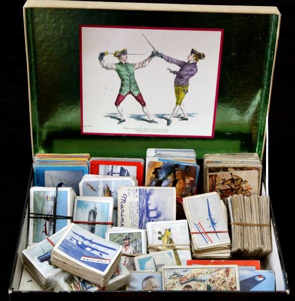 LARGE COLLECTION OF WWII MILITARY CIGARETTE CARDS: An unsearched large collection of cigarette and gum cards from the 1930-40s. Included are a variety of American and British makers to include: Cracker Jack, British Consols, Sweet Caporal Cigarettes, 