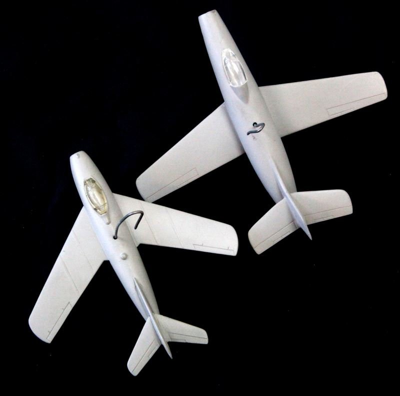 2 CRUVER ID MODELS MIG 15 RUSSIA FIGHTER & OURAGAN: Two Cruver ID model fighter planes, Post war. Includes a MIG 15 Russian Fighter (5.5 inch wingspan) (June, 1951), and a MD 450 Ouragan (6.5 inch wingspan) (May, 1955). Very good condition.