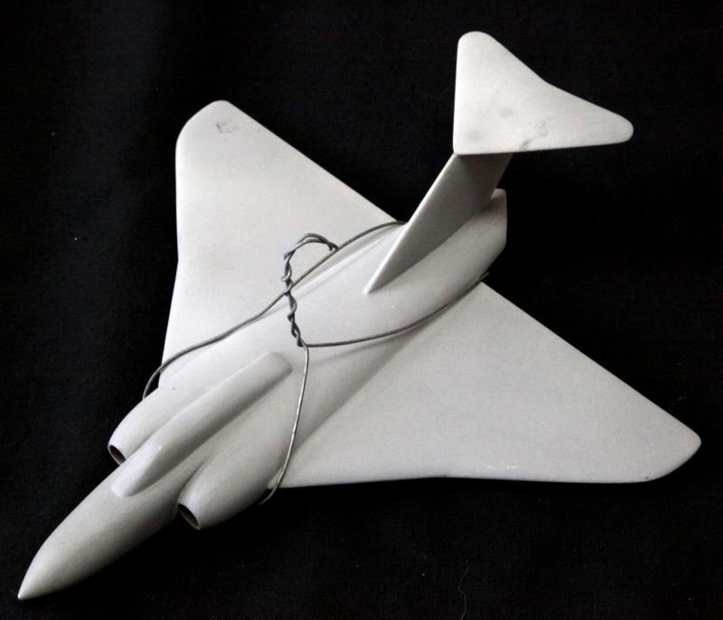 POST WAR GLOSTER JAVELIN MODEL FIGHTER PLANE: Primarily used by The Royal Air Force, retired in 1968. Wooden model, painted grey. Wingspan is 9 inches. Very good condition. Unmarked.