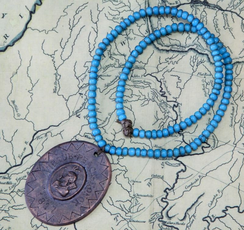 1817 FIVE CIVILIZED INDIAN TRIBES PEACE MEDAL BEAD: Turquoise trade bead necklace with a bronze 1817 Civilized Indian Tribes Peace Medal, August 5, 1817. Very good condition. From private collector.