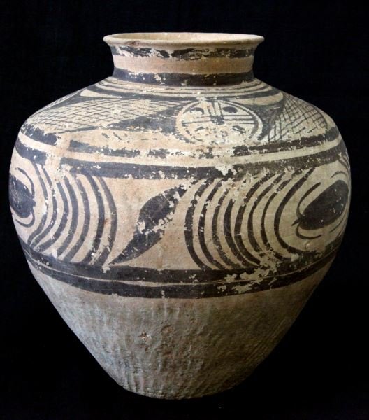 CHINESE NEOLITHIC POTTERY TERRACOTTA JAR VASE: Ancient Chinese pottery vase. Curved lines, cross-hatch, bug design to terracotta background. Vertical line inclusions toward base. Stands 9 inches tall, 9.5 inches wide. Very good condition. From pri