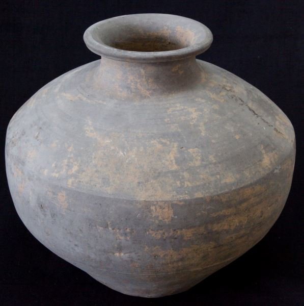 CHINESE HAN DYNASTY GREY STORAGE VESSEL: Han Dynasty (206 BC to 220 AD) grey food storage vessel. No chips or cracks, in very good condition considering age. 10 inches tall, 4.5 inches rim diameter, 11 inches at widest point.