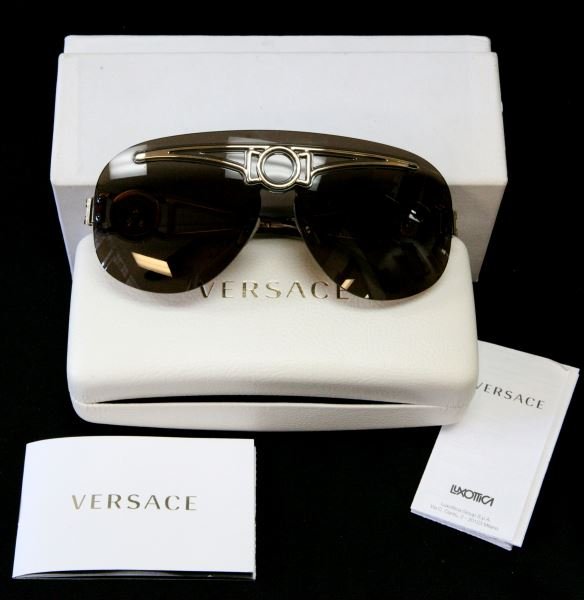 WOMENS VERSACE SUNGLASSES MODEL 2131 WITH BOX: Versace sunglasses model # 2131, with brown lens, metal & plastic frame. Comes with white case and white box. Glasses are used , but in very good condition
