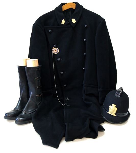 1945 MILAN URBAN POLICE LONG COAT HELMET & BOOTS: Nice condition long coat with numbered 1222 collar insignia, breast badge and whistle, cork cloth covered helmet with badge, rubber boot galoshes, all very good, from the World Police Museum and is ac