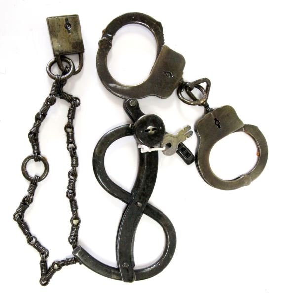 ANTIQUE POLICE HANDCUFF & RESTRAINT LOT: From the collection of the World Police Museum, Milan, Italy and accompanied with COA, two handcuffs one with key and hand restraints with lock no key, these have been varnished by the Museum, and unl