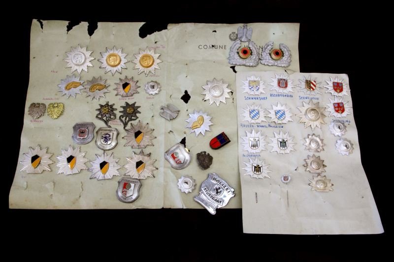 46 POST WAR GERMAN POLICE CAP BADGE COLLECTION: From the World Police Museum Milan, Italy and accompanied with COA, some duplication, most affixed to the museum paper board, all very good original condition.