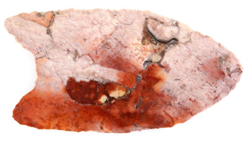 FT. PAYNE CHERT PALEO FLUTED ARROWHEAD: Classic northeastern Alabama pink lithic material, measures 2 5/8 inch with slightly uneven auricles, all indications of authenticity are eye apparent. 0
