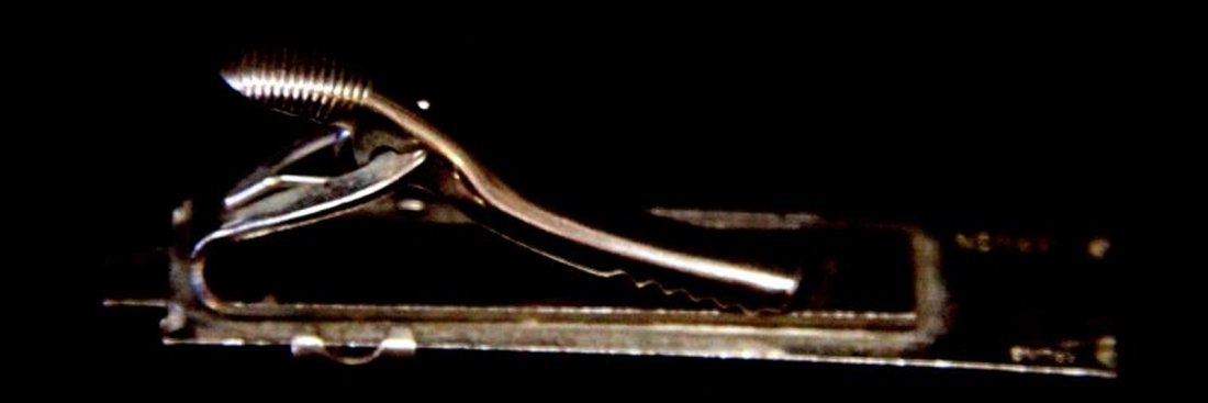 STERLING SILVER SLIDE RULE VERNON TIE BAR TAC: Working slide rule tie bar, measures two inches. 0