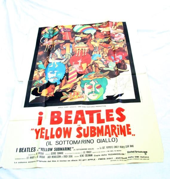 THE BEATLES YELLOW SUBMARINE POSTER ITALIAN 1968: Italian "The Beatles Yellow Submarine" poster (1968). Measures approximately 55 by 40 inches. Poster has visible signs of wear and tack holes. Overall good condition. 0