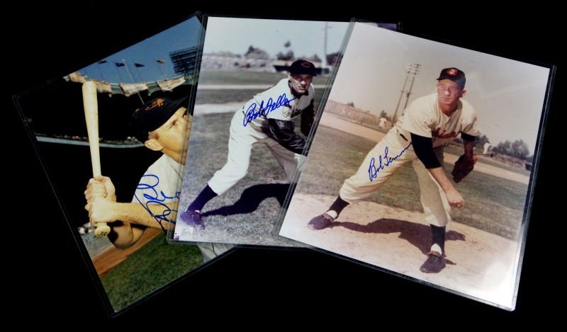 3 SIGNED BASEBALL PHOTOS FELLER LEMON ROBINSON: Three 8 by 10 inch color photos of Brooks Robinson, Bob Lemon & Bob Feller, all signed and in protective plastic sleeves. Feller & Lemon are from TV Sports Mailbag are dated 1988 and have the official