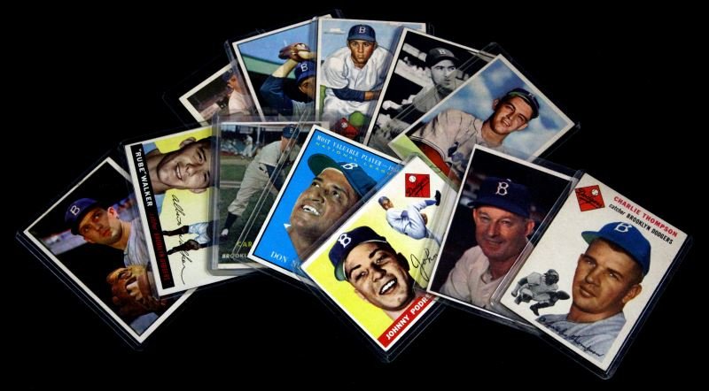 GROUPING OF 12 1950'S HIGHER GRADE BASEBALL CARDS: Grade range from 5 and better, consisting of: Billy Cox 60, Billy Loes 174, Billy Loes 14, Sal Maglie 5, Don Newcombe 483, Johnny Podres 25, Carl Erskine 252, Carl Erskine 12, Charlie Thompson 209, Ru