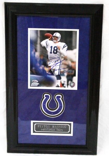 FRAMED PEYTON MANNING AUTOGRAPHED PICTURE W/ COA: Well made framed Peyton Manning Autograph picture while he was on the Indianapolis Colts. Frame measures approximately 26.5 by 16 inches. COA from Rich Altman's Hollywood Collectibles. Picture is a 8 