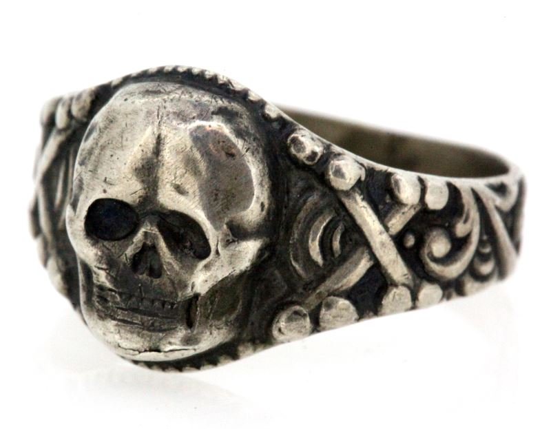 WWII GERMAN THIRD REICH SILVER SKULL RING 835 MARK: WWII German Nazi silver skull ring. Skull with cross bones to each side. 835 and maker's mark to inside. Size 10.5, weighs 4.3 grams.