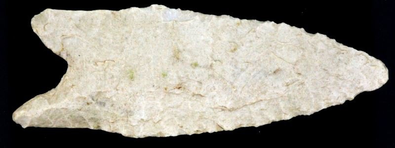ALABAMA ARCHAIC DALTON ARROWHEAD: Single side fluted point, random flaking for the most part , uneven auricles, well crafted measures 2 3/8 inches.