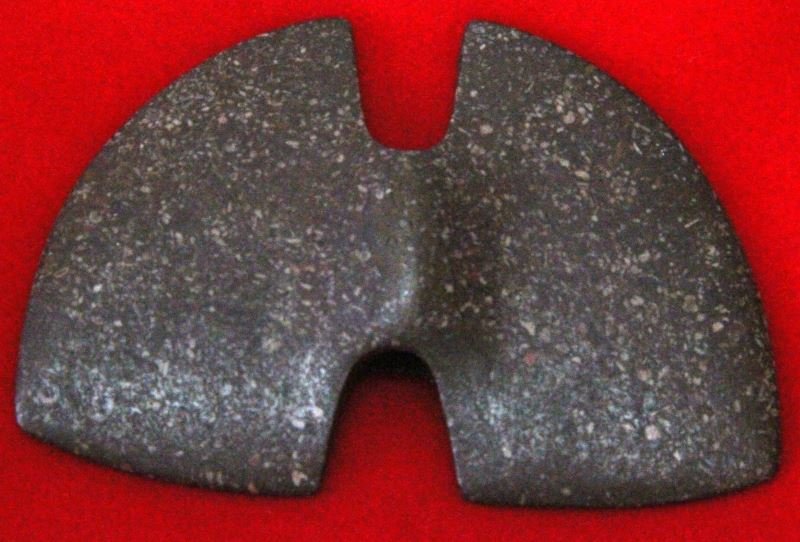 DOUBLE EDGED BUTTERFLY BANNERSTONE NATIVE AMERICAN: Winged or Butterfly Bannerstone made from a polished stone . Bannerstones where possibly used on the end of spears, but this is currently debated. The item is late Archaic or Early Woodlands. In very