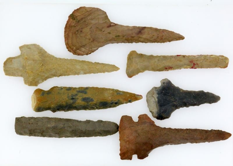 7 WOODLAND TRANSITIONAL LITHIC DRILL ARROWHEADS: Well crafted and complete 1 6/8 to 3 inches, northern Alabama southern Tennessee region and atypical chert to that region.