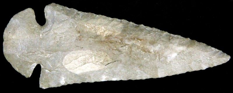 MARION COUNTY TN. DOVETAIL ARCHAIC ARROWHEAD: Rhomboid cross section with mostly random to opposing flaking, measures five inches and is nicely crafted, Museum marked, atypical regional chert.