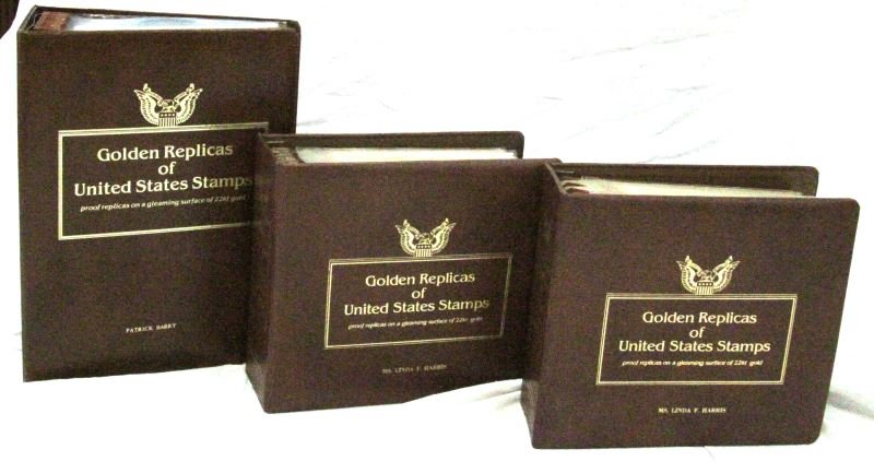GOLDEN REPLICAS OF UNITED STATES STAMPS 3 ALBUMS: Three albums with 22kt gold replicas of United States stamps. The golden replica is accompanied by the first day issue of its respective stamp. This collection has over 90 stamps, and three volumes. T