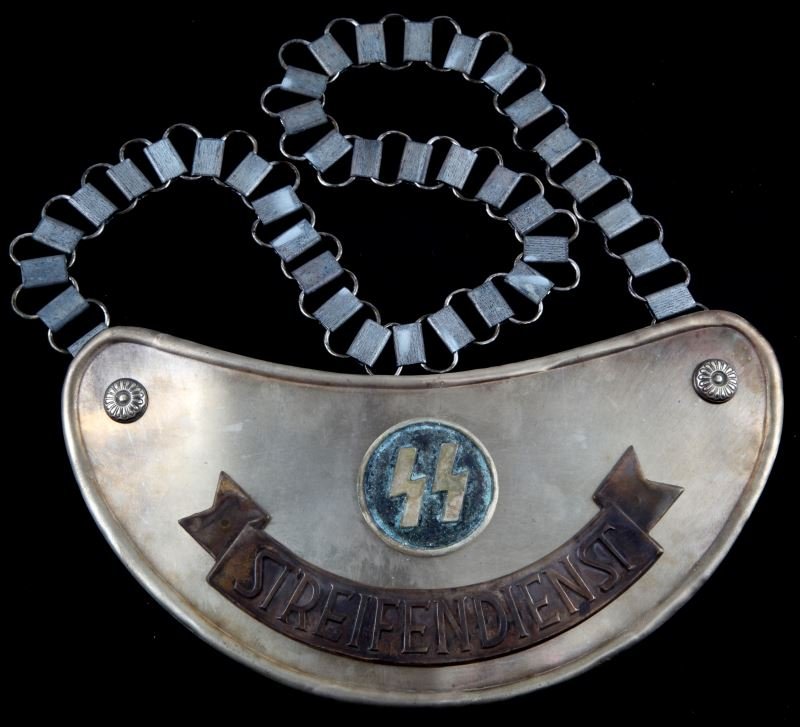 GERMAN THIRD REICH WWII GORGET STREIFENDIENST: Some discoloring and tarnishing present to gorget; overall in very good condiiton. Unauthenticated. This lot has a reserve.