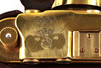 REPRODUCTION WWII 1936 LEICA BERLIN OLYMPICS: Some wear and show of age present to camera; overall in very good condiiton. Unauthenticated. This lot has a reserve.