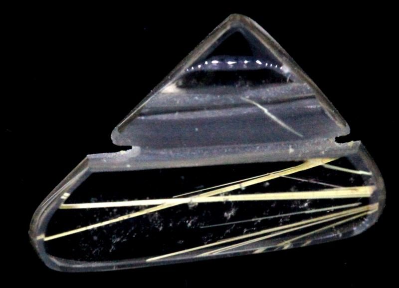 RUTILLATED QUARTZ BY MICHAEL DYBER 7.18 CARATS: A Michael Dyber creation, rutillated quartz sculpture, weighing 7.18 carats. In good condition.