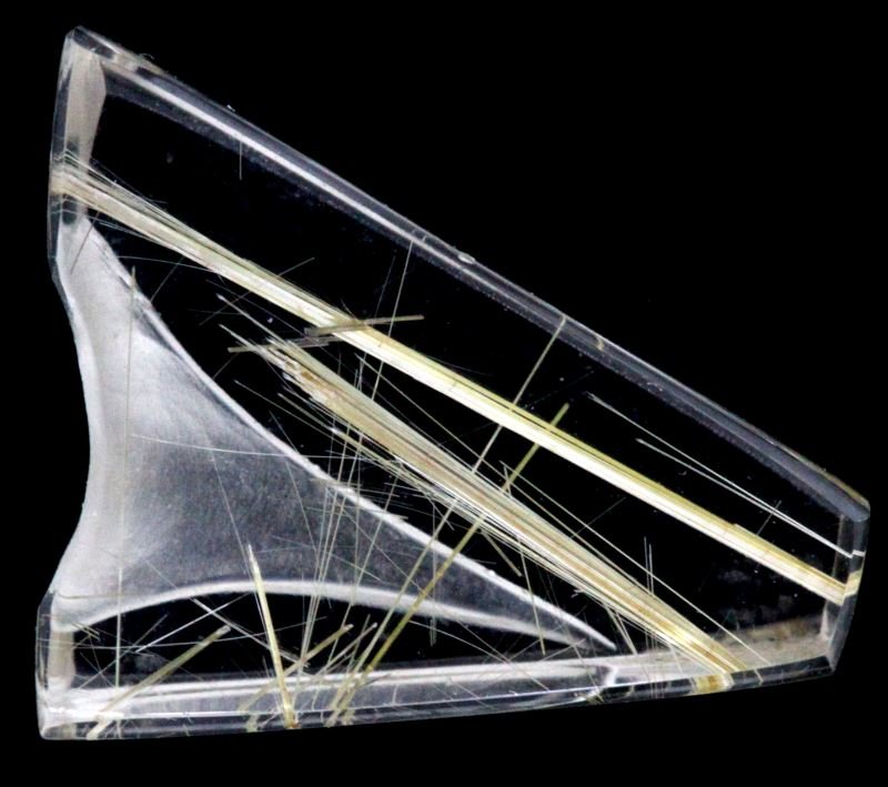 RUTILLATED QUARTZ CARVING BY MICHAEL DYBER 6.53 CT: Signed by Michael Dyber, carved rutillated quartz, measuring 15 x 13 x 4.4mm. Weighs 6.53 carats. In very good condition.