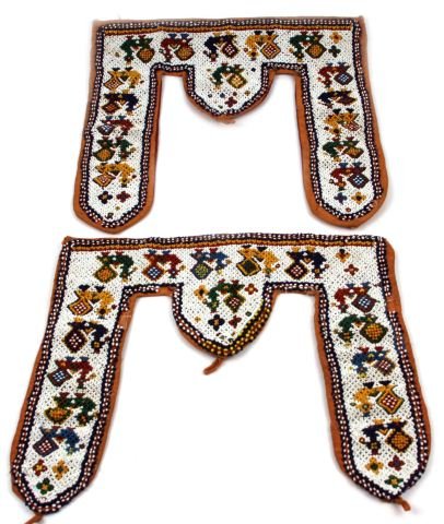 VINTAGE CENTRAL AMERICAN BEADWORK GARMENT: Vintage Central American beaded garment, decorated with birds and flowers. Measures 12.5 by 11 inches. There are some loose or missing beads, but the central pattern is complete The item is also struc